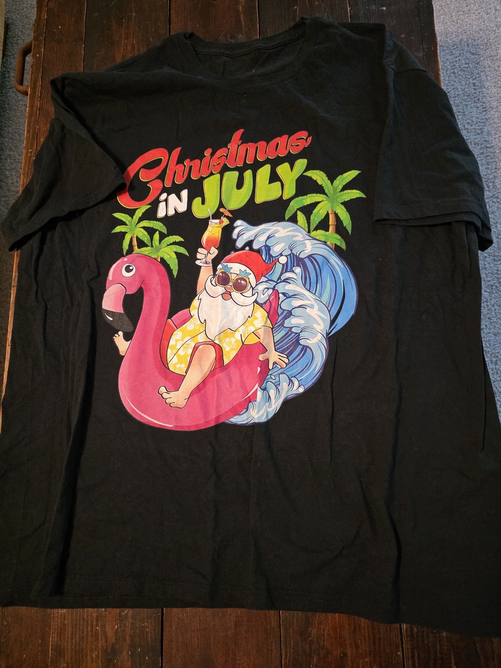 Christmas in July Black Graphic Tee with Pink Flamingo and Tropical Santa